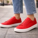 How to Wear Red Sneakers and Make a Powerful Style Statement